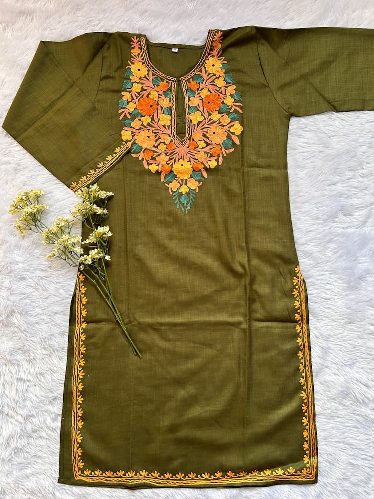 i
Traditional green Kashmiri long kurta designed for winter ethnic fashion by Hayat's Lucknowi