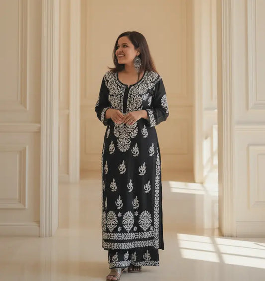 Black rayon kurta set with chikankari embroidery by Hayat’s Lucknowi