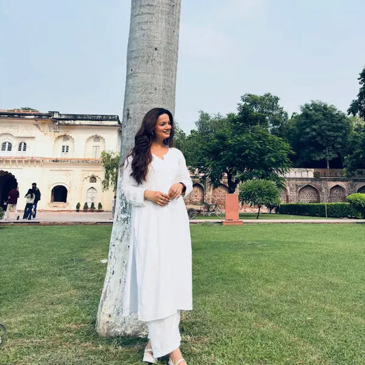 Khushi white rayon Lucknowi Chikankari kurta set featuring intricate handcrafted white Chikankari embroidery on soft, breathable rayon fabric for elegant everyday and festive ethnic wear by Hayat's Lucknowi.
