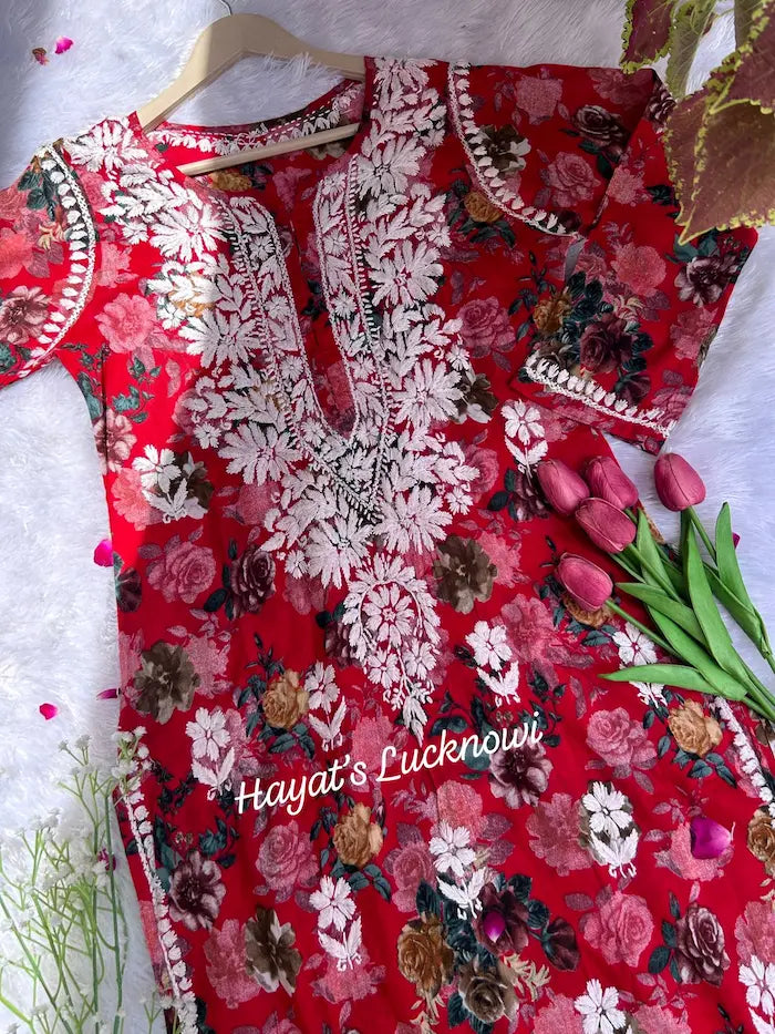 Red mul mul kurta with chikankari embroidery by Hayat’s Lucknowi
