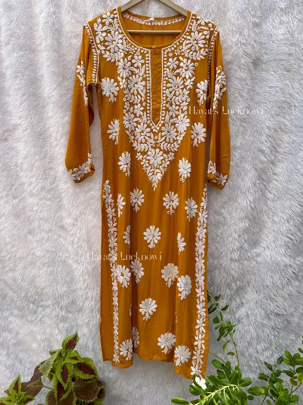 Mustard modal kurti with chikankari embroidery by Hayat’s Lucknowi