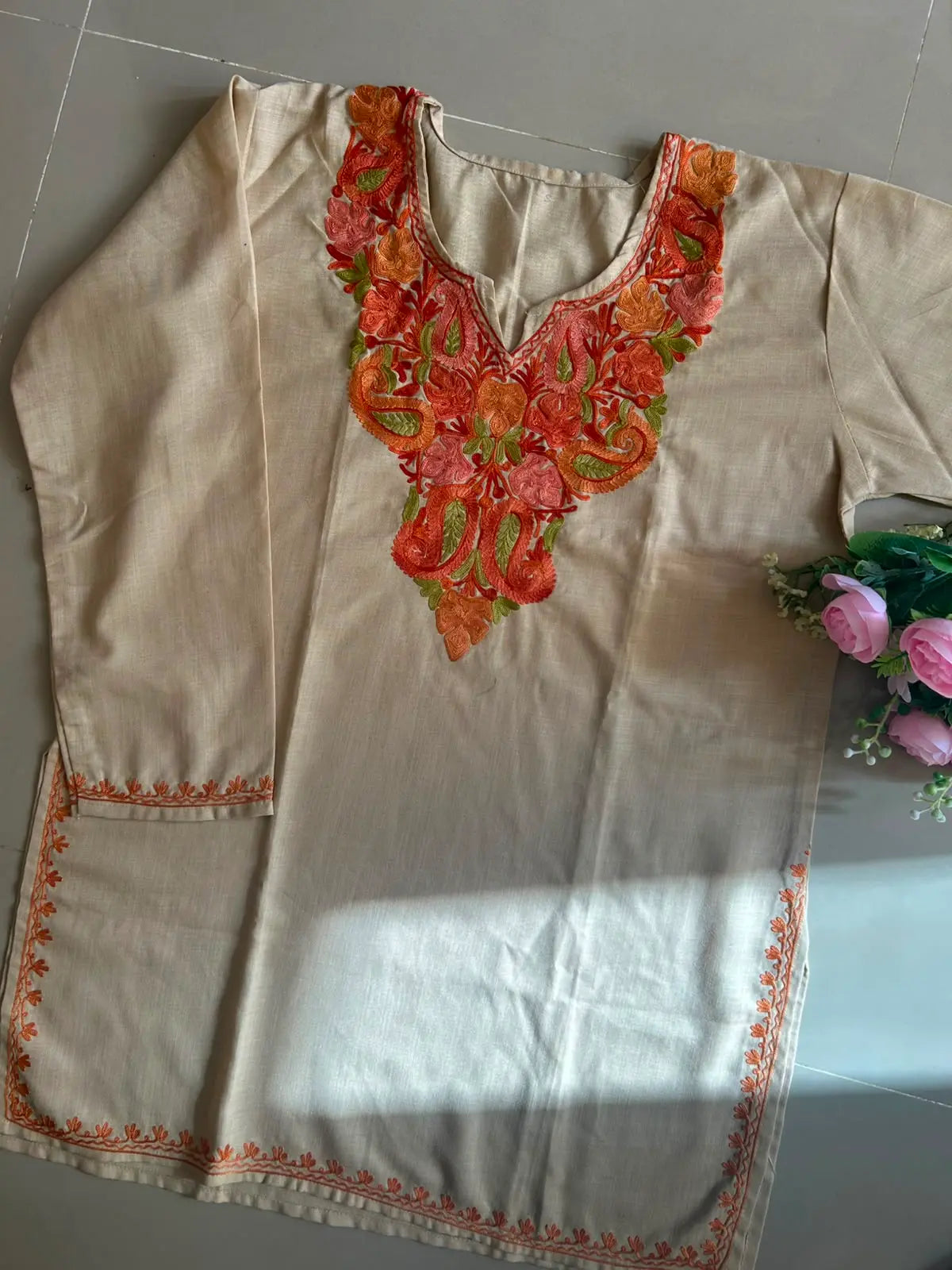Rida ivory cotton Kashmiri short embroidered kurti featuring intricate traditional Kashmiri embroidery and soft breathable cotton fabric for timeless everyday ethnic wear by Hayat's Lucknowi.