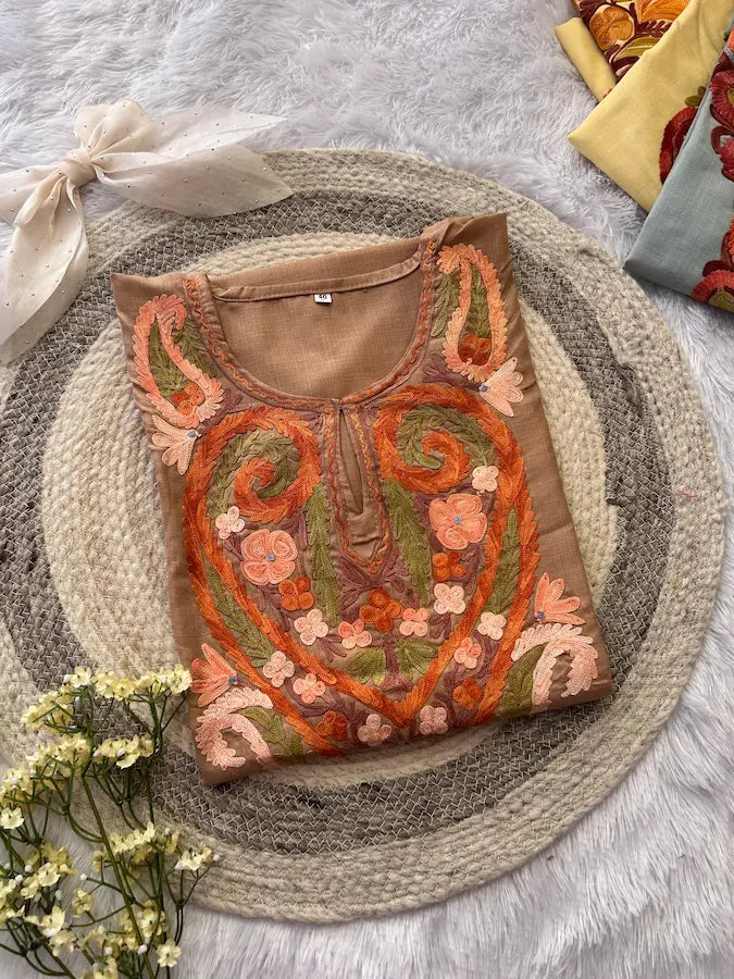 Tan brown Kashmiri long kurta featuring elegant traditional embroidery-inspired detailing and timeless craftsmanship for sophisticated ethnic wear by Hayat's Lucknowi.