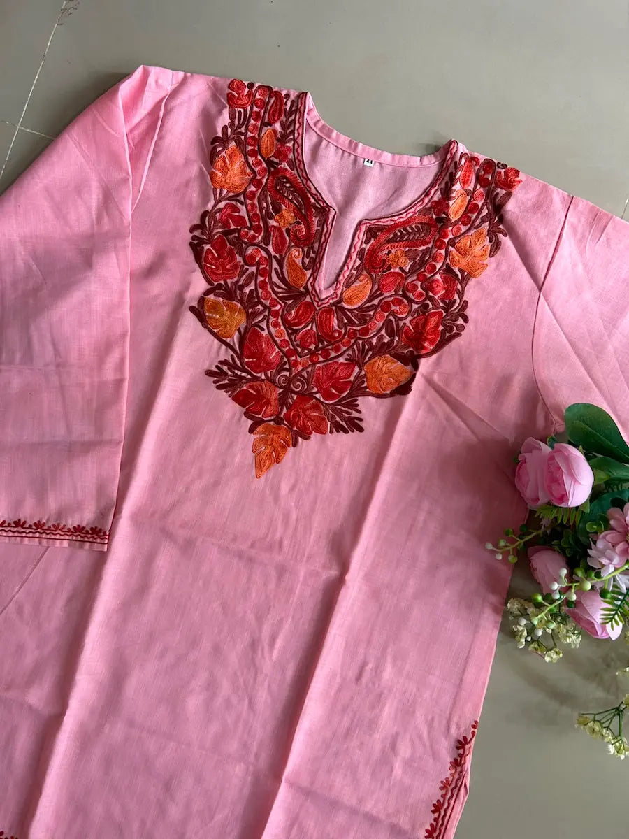 Baby pink cotton Kashmiri short embroidered kurti featuring intricate traditional Kashmiri embroidery and soft breathable cotton fabric for delicate and elegant everyday ethnic wear by Hayat's Lucknowi.