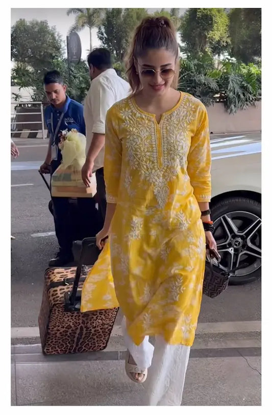 Yellow mul mul kurta with chikankari embroidery by Hayat’s Lucknowi