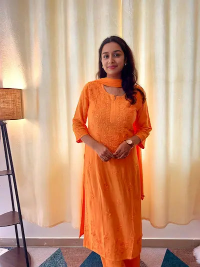 Mustard rayon kurta set with chikankari embroidery by Hayat’s Lucknowi