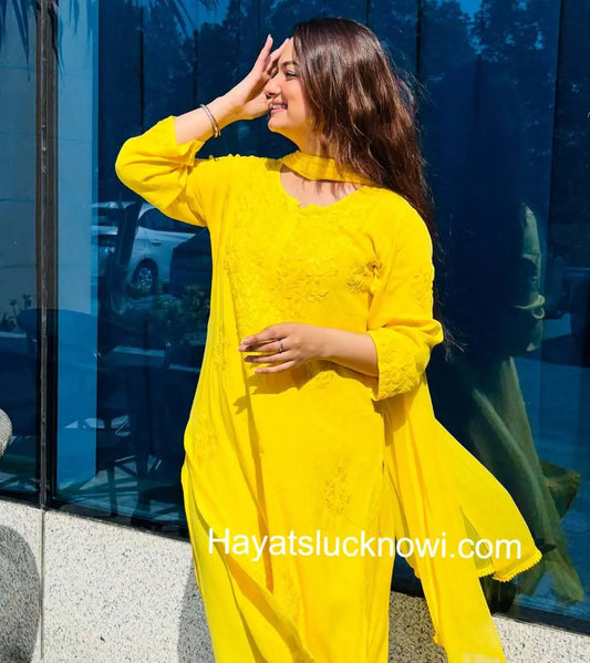 Zeenat yellow rayon Lucknowi chikankari kurta set with dupatta featuring delicate hand embroidery and elegant traditional craftsmanship for graceful ethnic wear by Hayat's Lucknowi