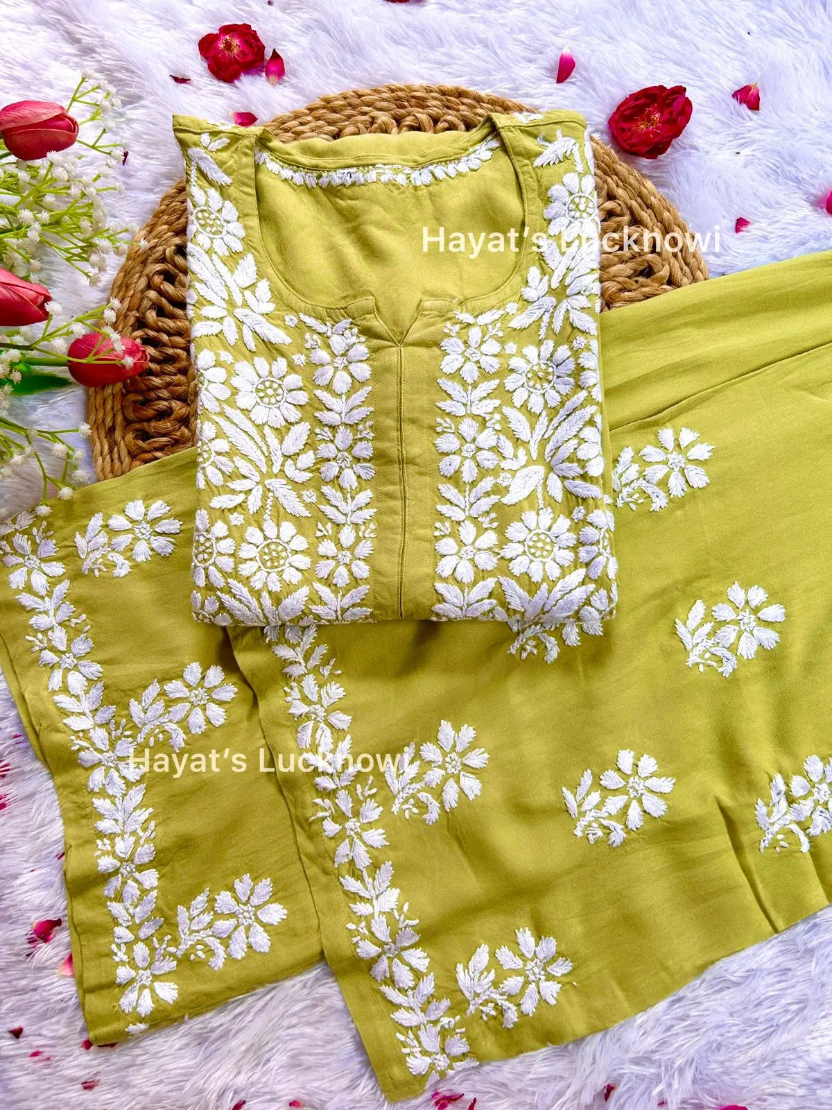 Green chikankari rayon kurta set with intricate white floral embroidery, The set is from Hayat&