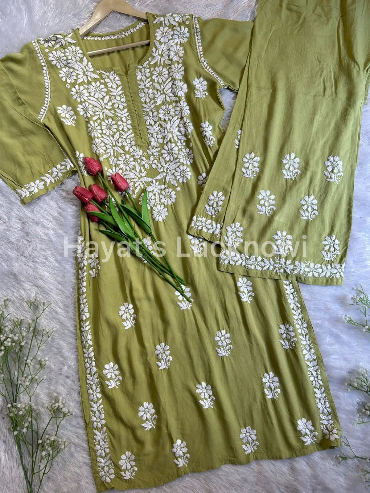 Green chikankari rayon kurta set with intricate white floral embroidery, The set is from Hayat&