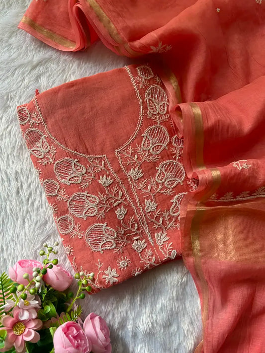 
Aaliya women's peach mul Chanderi handwork kurta and dupatta unstitched suit featuring intricate handcrafted detailing and elegant traditional craftsmanship for graceful festive and ethnic wear by Hayat's Lucknowi.
