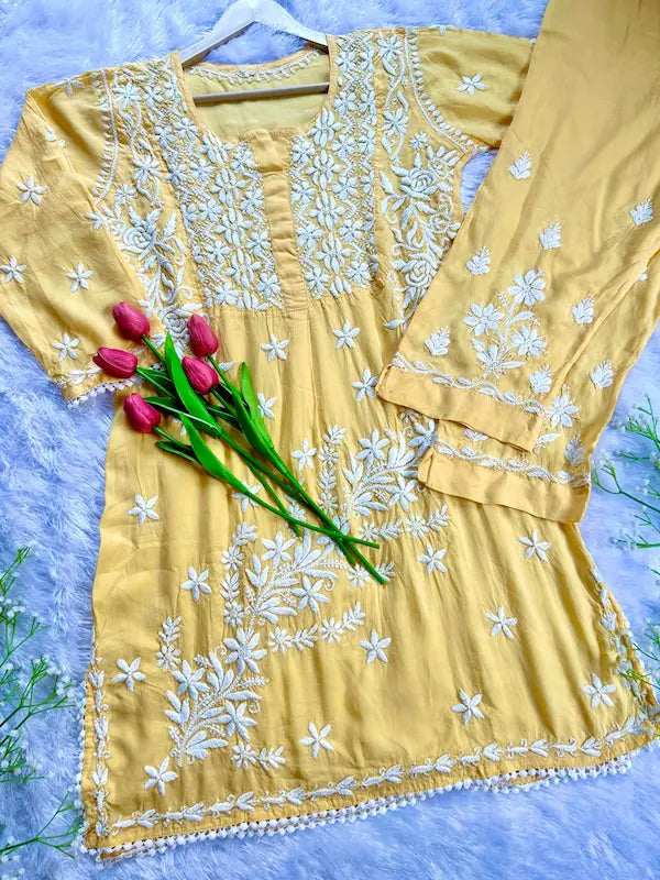 
Aiman yellow modal Lucknowi chikankari kurta set featuring delicate hand embroidery for a bright and elegant ethnic ensemble by Hayat's Lucknowi
