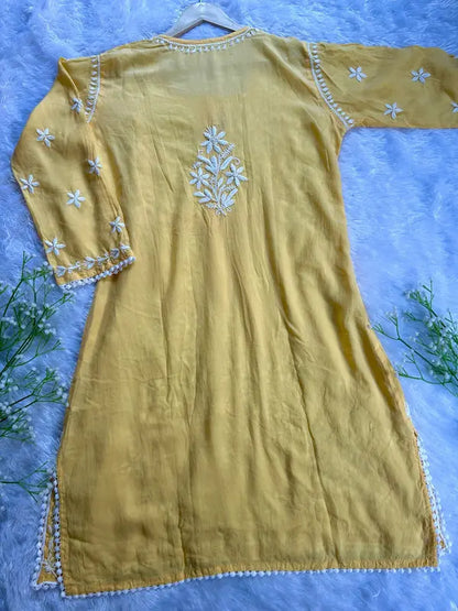 
Aiman yellow modal Lucknowi chikankari kurta set featuring delicate hand embroidery for a bright and elegant ethnic ensemble by Hayat's Lucknowi
