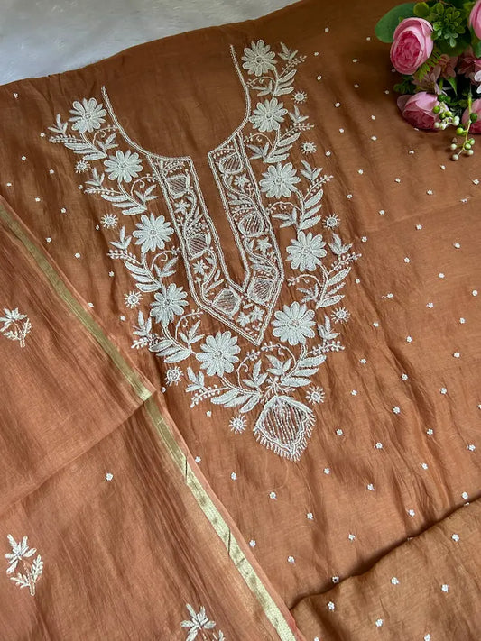 
Amber women's brown mul Chanderi handwork kurta and dupatta unstitched suit featuring intricate handcrafted detailing and elegant traditional styling for timeless ethnic wear by Hayat's Lucknowi.
