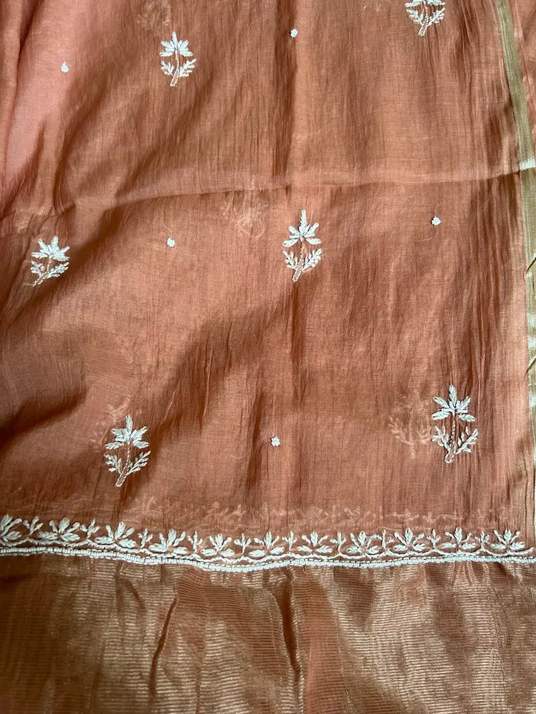 
Amber women's brown mul Chanderi handwork kurta and dupatta unstitched suit featuring intricate handcrafted detailing and elegant traditional styling for timeless ethnic wear by Hayat's Lucknowi.
