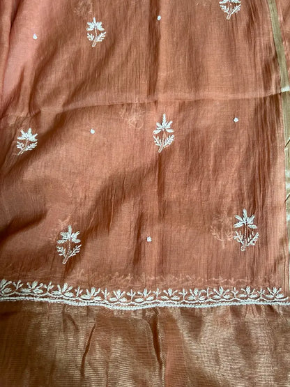 
Amber women's brown mul Chanderi handwork kurta and dupatta unstitched suit featuring intricate handcrafted detailing and elegant traditional styling for timeless ethnic wear by Hayat's Lucknowi.
