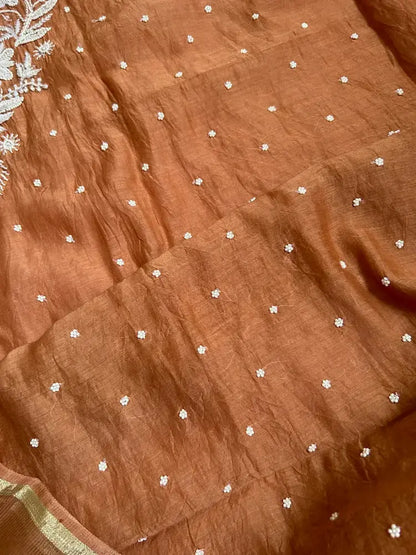 
Amber women's brown mul Chanderi handwork kurta and dupatta unstitched suit featuring intricate handcrafted detailing and elegant traditional styling for timeless ethnic wear by Hayat's Lucknowi.
