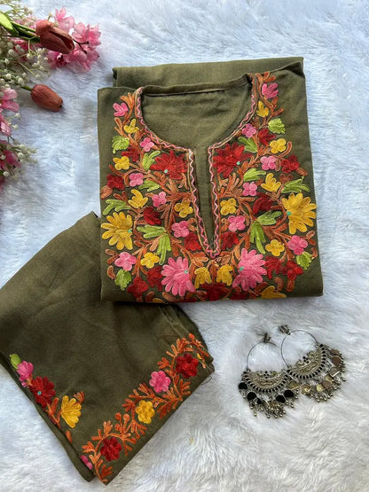 
Ash brown Kashmiri woolen pheran co-ord set designed for winter ethnic elegance by Hayat's Lucknowi
