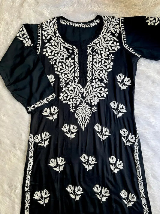 
Avneet Kaur inspired black modal kurti crafted with intricate Lucknowi chikankari embroidery for a stylish and elegant ethnic look by Hayat's Lucknowi

