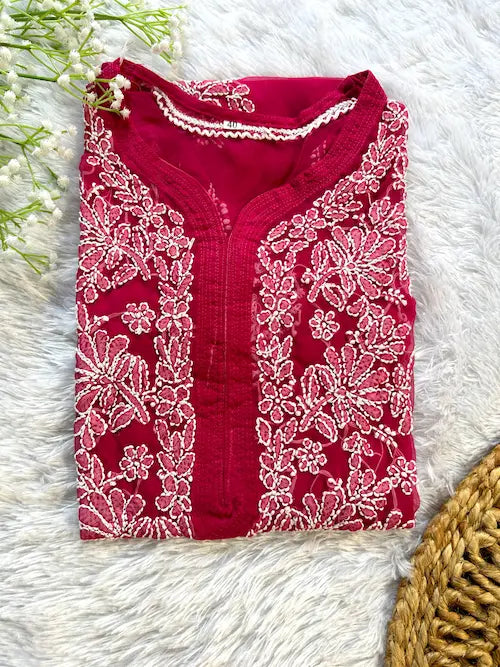 Deep pink georgette kurti with chikankari embroidery by Hayat’s Lucknowi