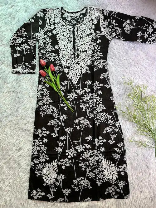 
Batool black mul mul chikankari kurta featuring delicate hand embroidery and soft breathable fabric for elegant, timeless everyday ethnic wear by Hayat's Lucknowi.
