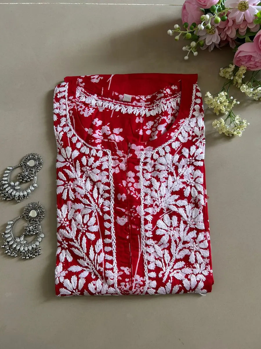 Batool Red Mul Mul Chikankari Kurta featuring intricate hand embroidery on lightweight, soft and breathable Mul Mul cotton fabric for an elegant everyday ethnic look by Hayat’s Lucknowi.
