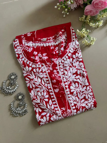Batool Red Mul Mul Chikankari Kurta featuring intricate hand embroidery on lightweight, soft and breathable Mul Mul cotton fabric for an elegant everyday ethnic look by Hayat’s Lucknowi.
