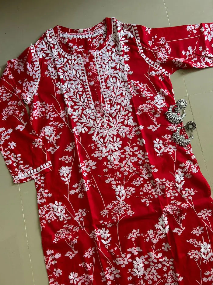 Batool Red Mul Mul Chikankari Kurta featuring intricate hand embroidery on lightweight, soft and breathable Mul Mul cotton fabric for an elegant everyday ethnic look by Hayat’s Lucknowi.
