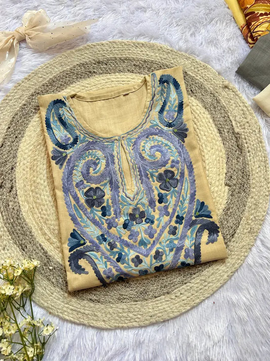 
Beige blue color work Kashmiri long kurta featuring intricate traditional embroidery-inspired detailing and elegant handcrafted craftsmanship for timeless ethnic wear by Hayat's Lucknowi.
