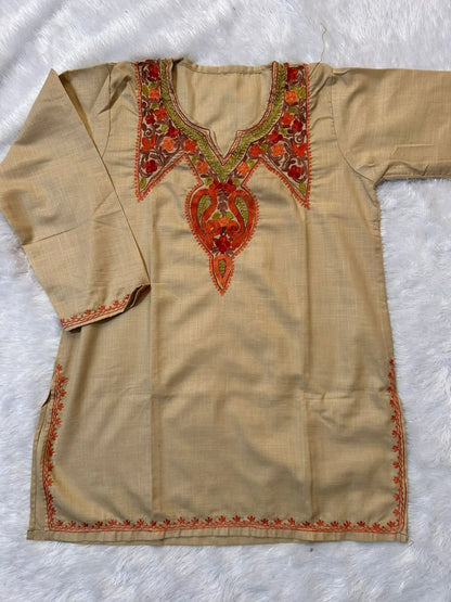 
Beige Kashmiri short kurta featuring elegant traditional embroidery-inspired detailing and refined handcrafted craftsmanship for comfortable everyday ethnic wear by Hayat's Lucknowi.
