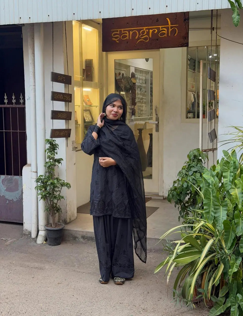 Black Chikankari Farshi Shalwar Suit featuring intricate traditional hand embroidery for a graceful and elegant ethnic look by Hayat’s Lucknowi.
