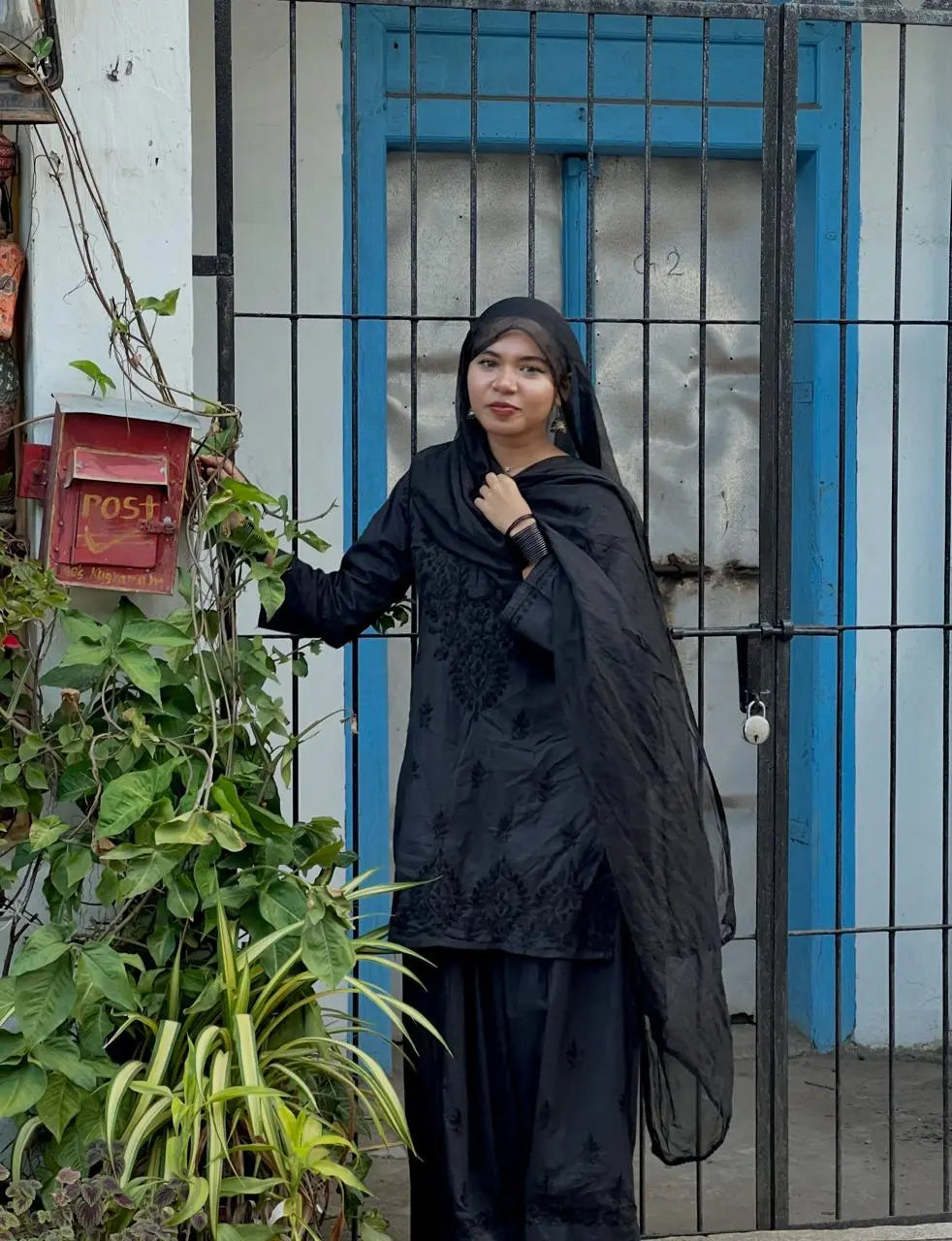 Black Chikankari Farshi Shalwar Suit featuring intricate traditional hand embroidery for a graceful and elegant ethnic look by Hayat’s Lucknowi.
