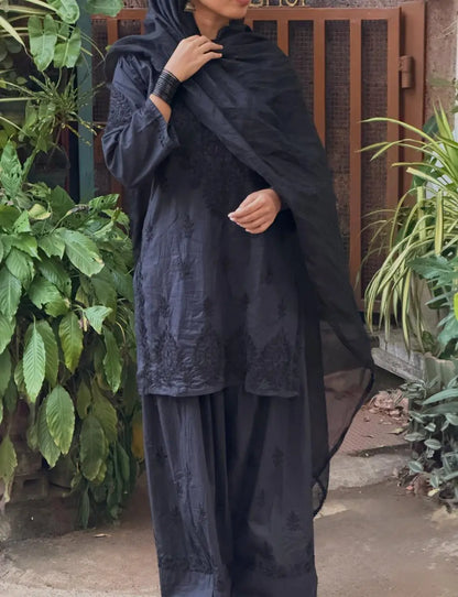 Black Chikankari Farshi Shalwar Suit featuring intricate traditional hand embroidery for a graceful and elegant ethnic look by Hayat’s Lucknowi.
