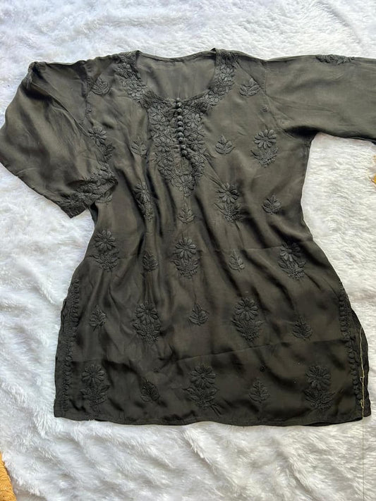 
Black chikankari short kurti crafted with intricate Lucknowi embroidery for stylish and elegant ethnic wear by Hayat's Lucknowi
