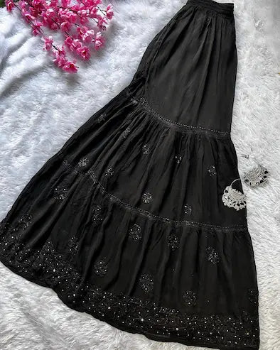 Black viscose georgette gharara set with chikankari and mukesh embroidery by Hayat’s Lucknowi