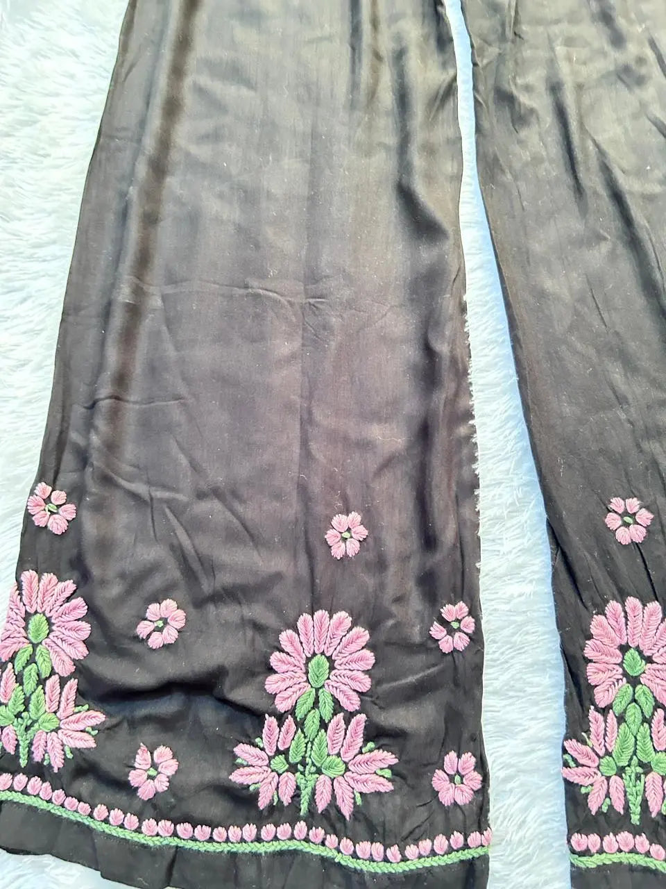 
Black rayon chikankari kurta set with dupatta showcasing intricate hand embroidery by Hayat's Lucknowi

