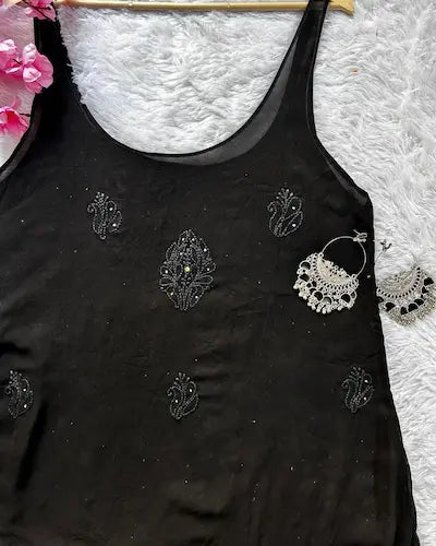 Black viscose georgette gharara set with chikankari and mukesh embroidery by Hayat’s Lucknowi”