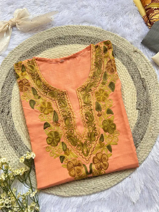 
Blossom peach Kashmiri long kurta designed with elegant winter embroidery by Hayat's Lucknowi
