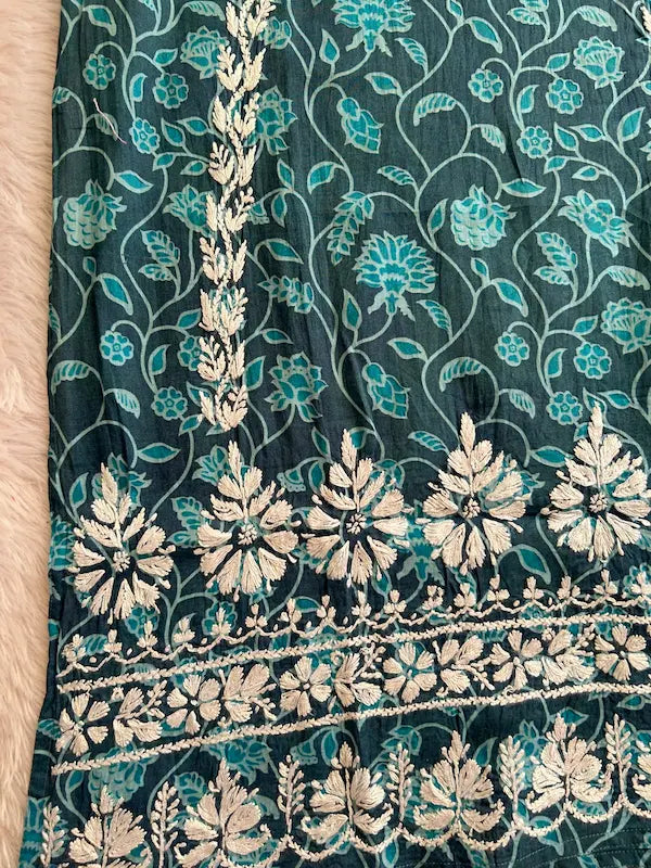 
Fariha blue mul mul Lucknowi chikankari kurta featuring delicate hand embroidery and soft breathable fabric for elegant everyday ethnic wear by Hayat's Lucknowi.
