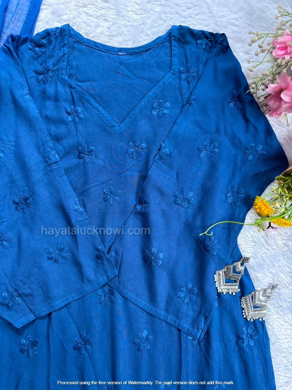 
Blue Rayon Chikankari Farshi Set featuring intricate hand embroidery on soft rayon fabric for a graceful traditional and festive look by Hayat’s Lucknowi.
