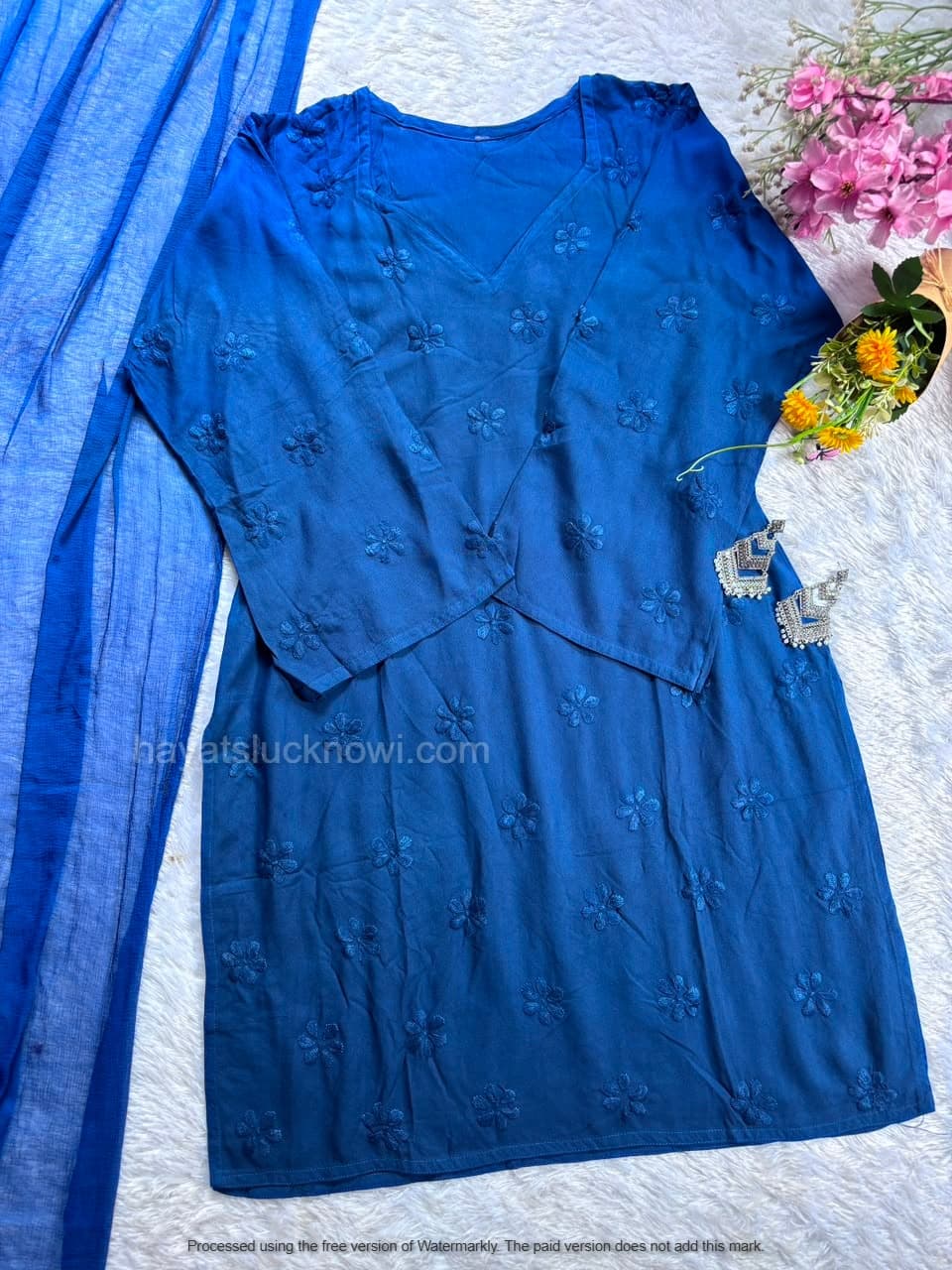 

Blue Rayon Chikankari Farshi Set featuring intricate hand embroidery on soft rayon fabric for a graceful traditional and festive look by Hayat’s Lucknowi.
