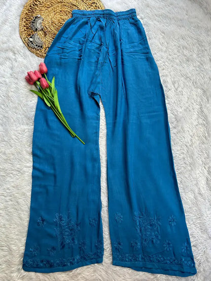 
Zeenat blue rayon Lucknowi chikankari kurta set with dupatta featuring intricate hand embroidery and elegant traditional craftsmanship for timeless festive and ethnic wear by Hayat's Lucknowi.

