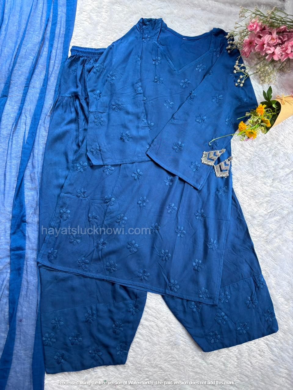 

Blue Rayon Chikankari Farshi Set featuring intricate hand embroidery on soft rayon fabric for a graceful traditional and festive look by Hayat’s Lucknowi.
