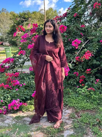 
Brown chikankari Farshi shalwar suit featuring intricate hand embroidery and elegant traditional craftsmanship for sophisticated festive and ethnic wear by Hayat's Lucknowi.
