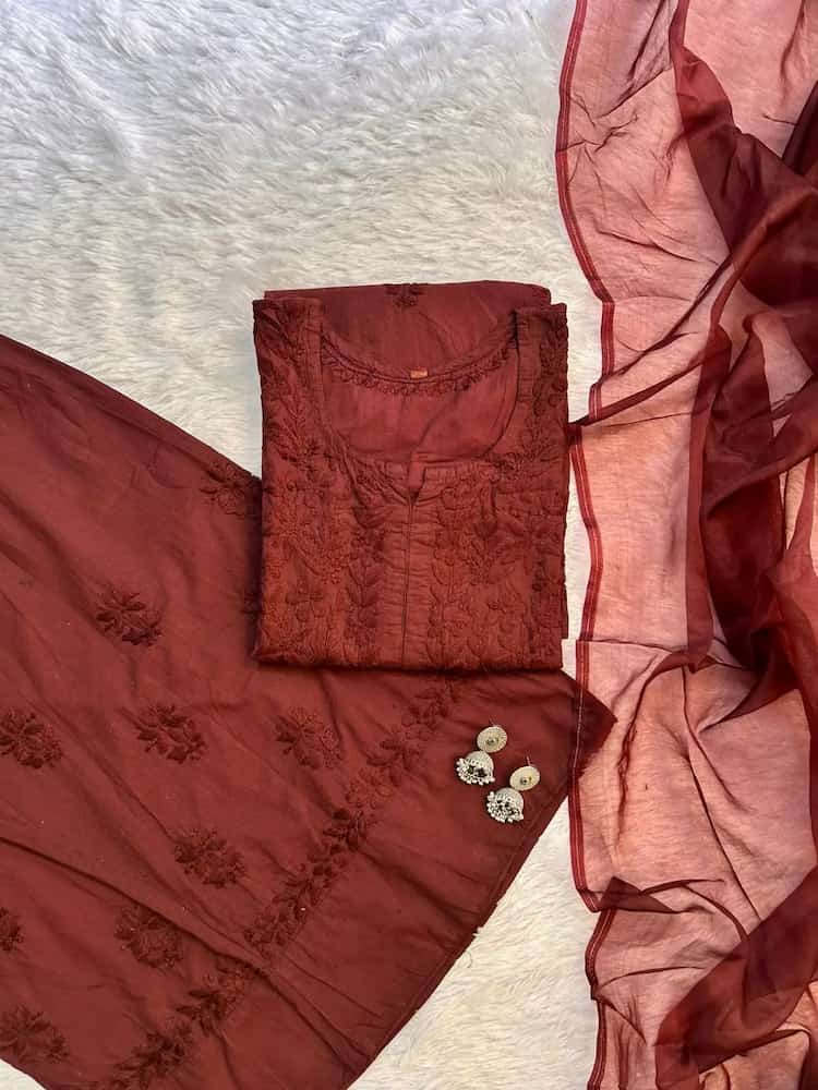
Brown chikankari Farshi shalwar suit featuring intricate hand embroidery and elegant traditional craftsmanship for sophisticated festive and ethnic wear by Hayat's Lucknowi.
