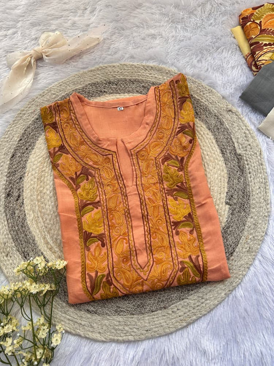 
Peach Kashmiri long kurta inspired by traditional chinar motifs and embroidery by Hayat's Lucknowi
