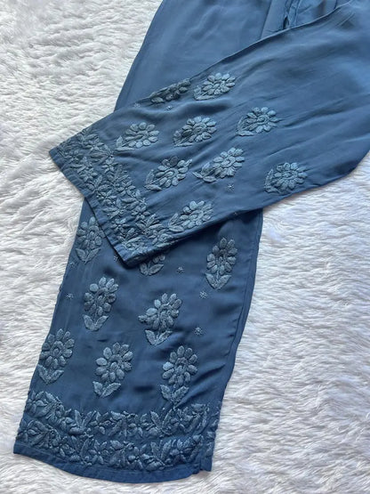 
Zoya denim blue georgette chikankari kurta set with dupatta featuring elegant hand embroidery for graceful and stylish ethnic wear by Hayat's Lucknowi