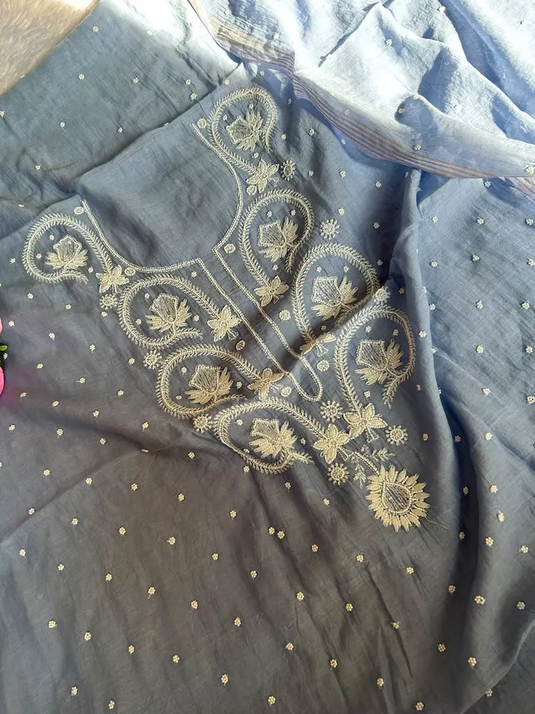 
Falak women's blue mul Chanderi handwork kurta and dupatta unstitched suit featuring intricate handcrafted detailing and elegant traditional craftsmanship for timeless ethnic wear by Hayat's Lucknowi.
