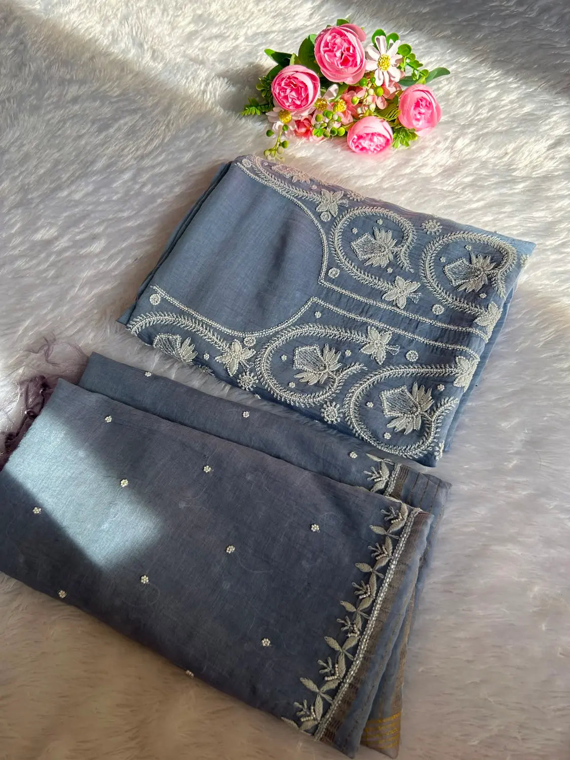 
Falak women's blue mul Chanderi handwork kurta and dupatta unstitched suit featuring intricate handcrafted detailing and elegant traditional craftsmanship for timeless ethnic wear by Hayat's Lucknowi.
