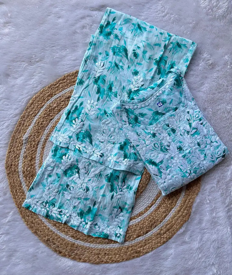 
Farheen aqua green chikankari printed mul mul set featuring soft breathable fabric, delicate prints, and elegant traditional styling for fresh and graceful everyday ethnic wear by Hayat's Lucknowi.
