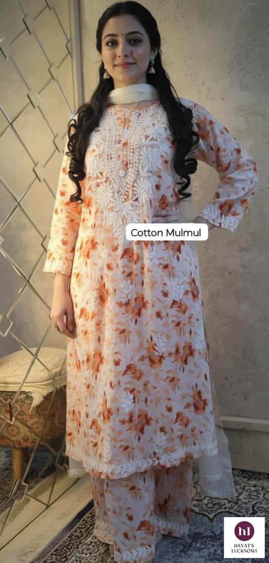 
Farheen peach chikankari printed mul mul set featuring soft breathable fabric, delicate prints, and elegant traditional styling for graceful everyday ethnic wear by Hayat's Lucknowi.
